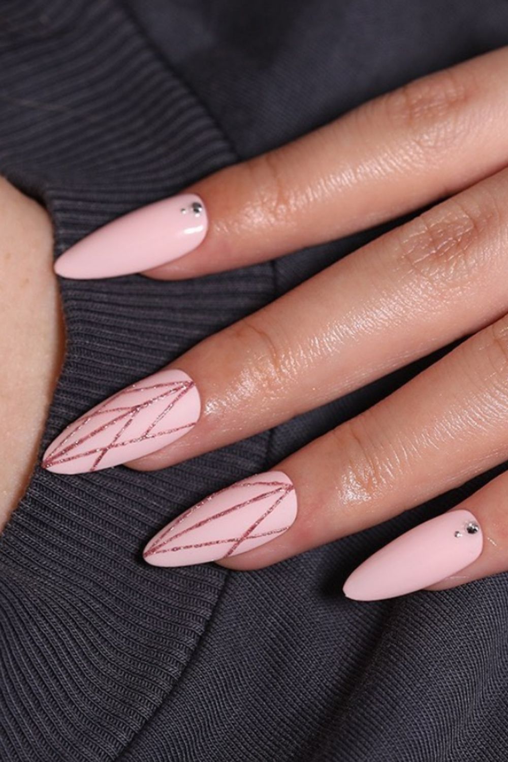 Pink and glitter almond shaped nails