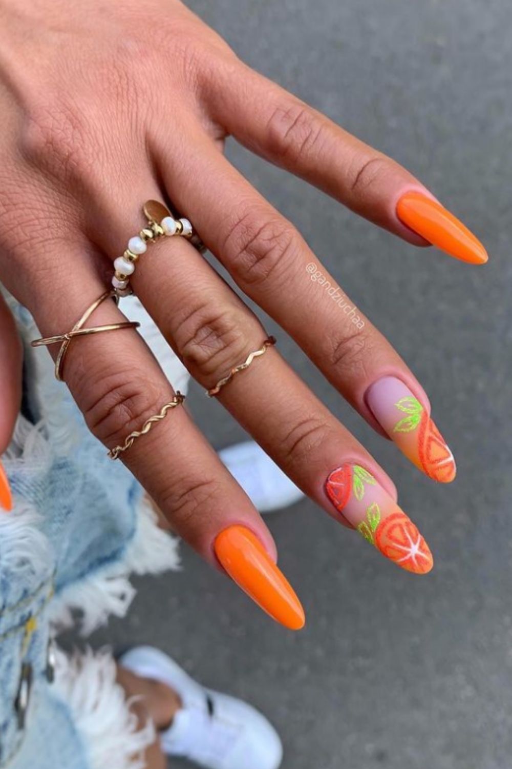 Orange almond nails designs