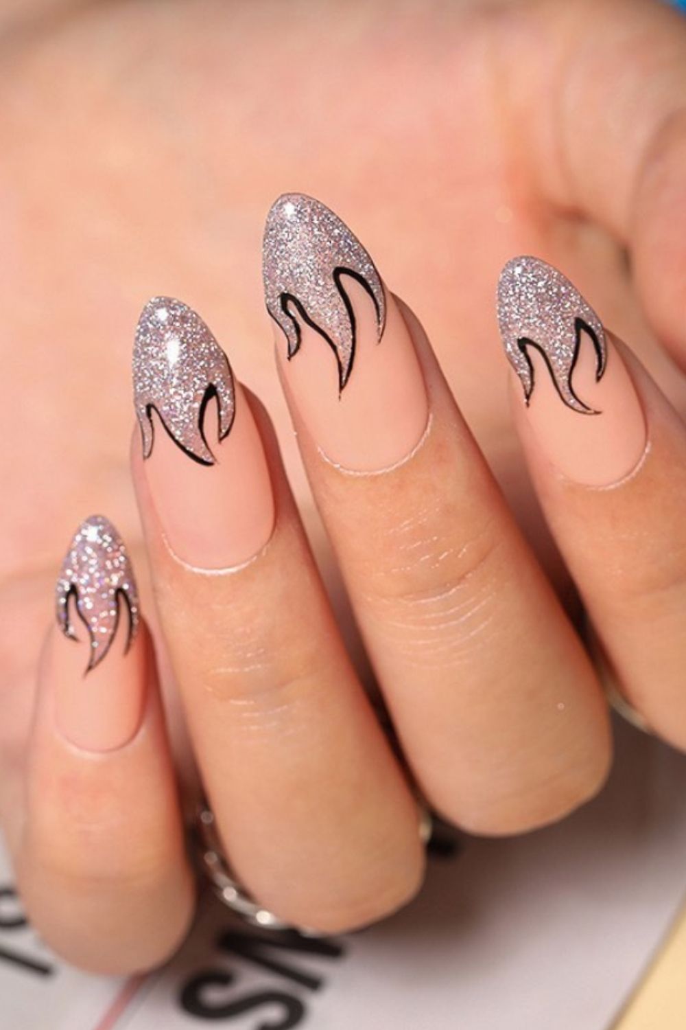 Shiny silver almond shaped nails