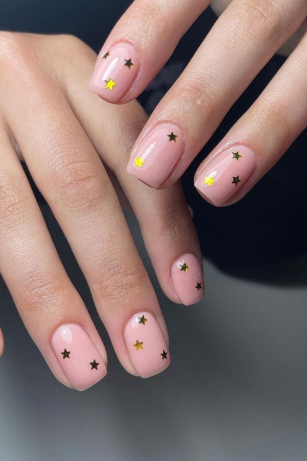Pink short square nails art with Spinned pentagram