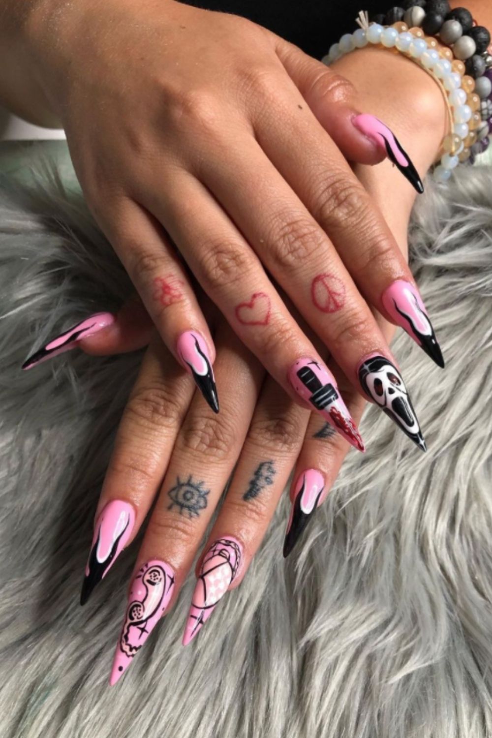 Pink and black stiletto nails art