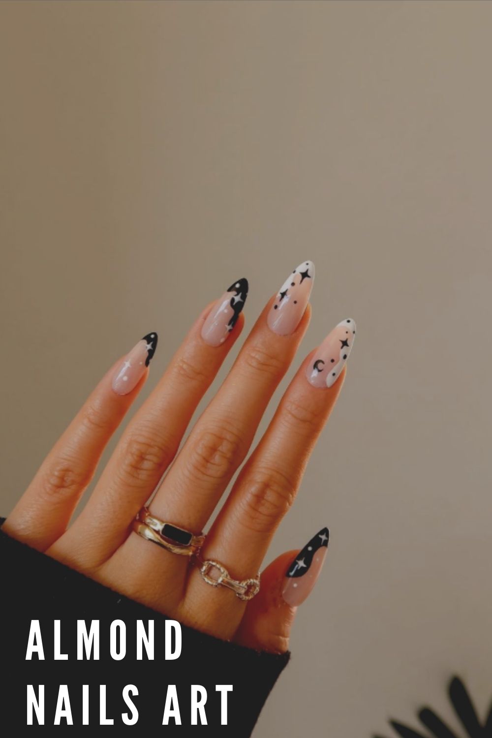 White and black almond nails with star