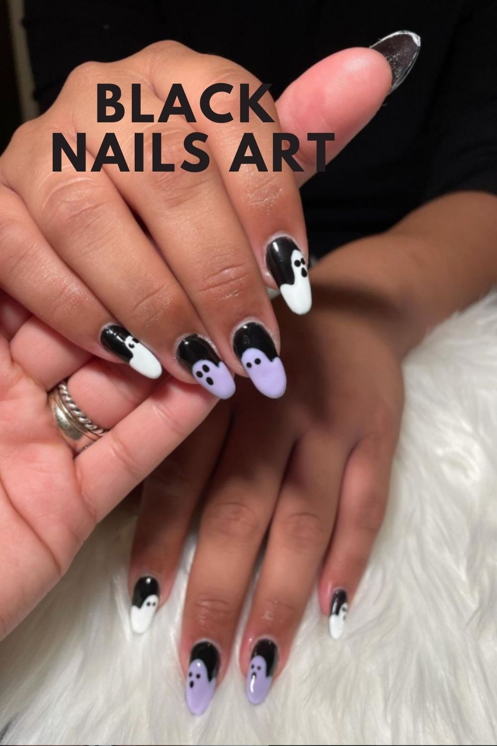 Black nail design with ghost