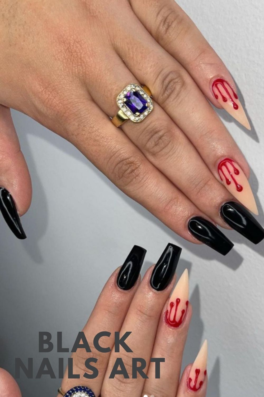 Black and red nail design with blood drops