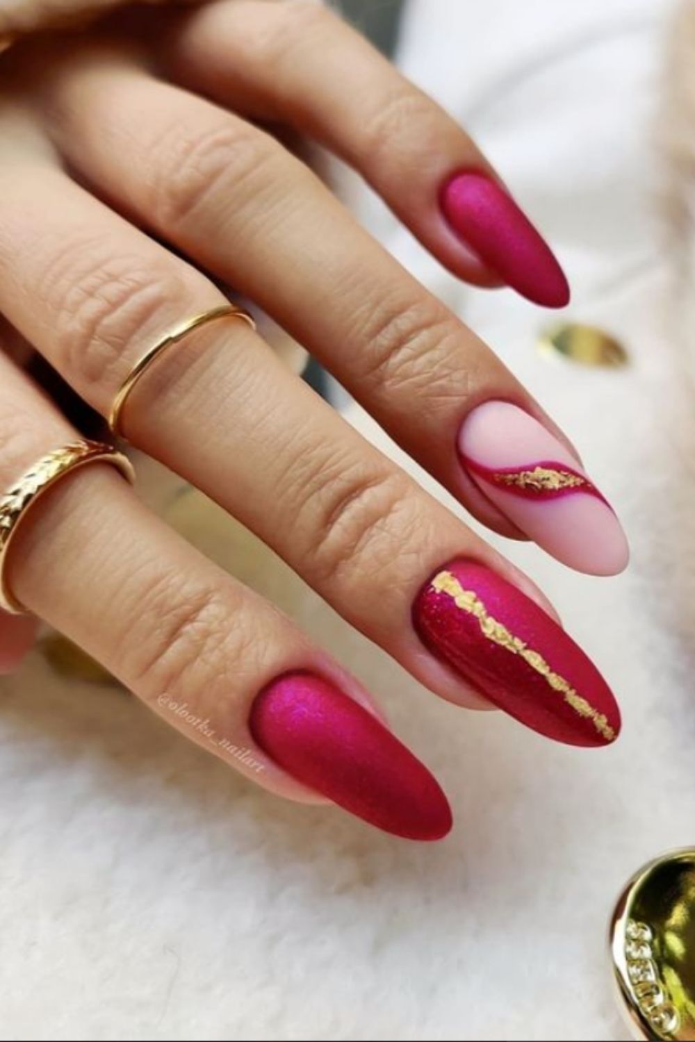 Red and gold almond nails