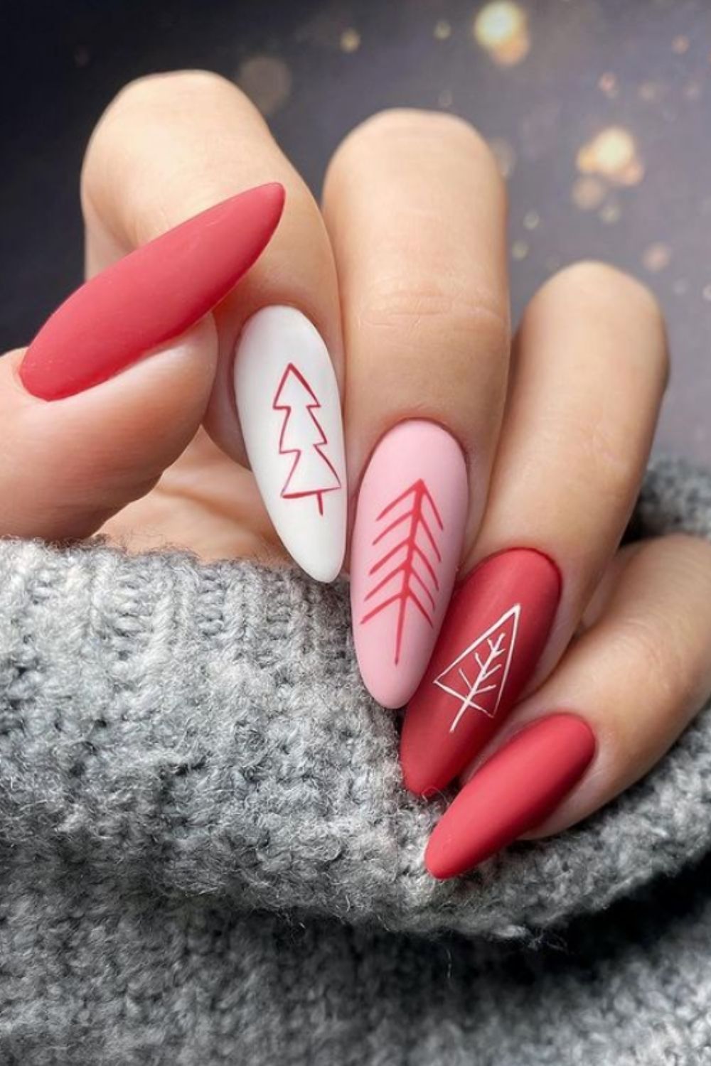 Almond nails art with chritmas tree