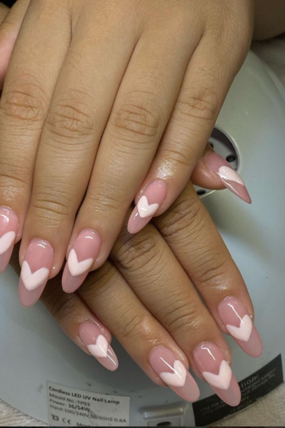 Pink almond nails with heart