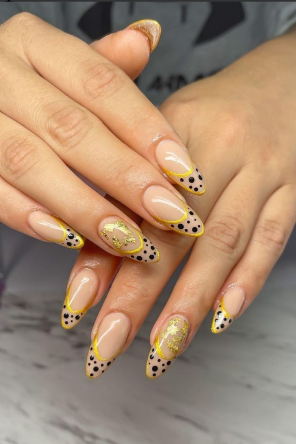 Yellow and black nails