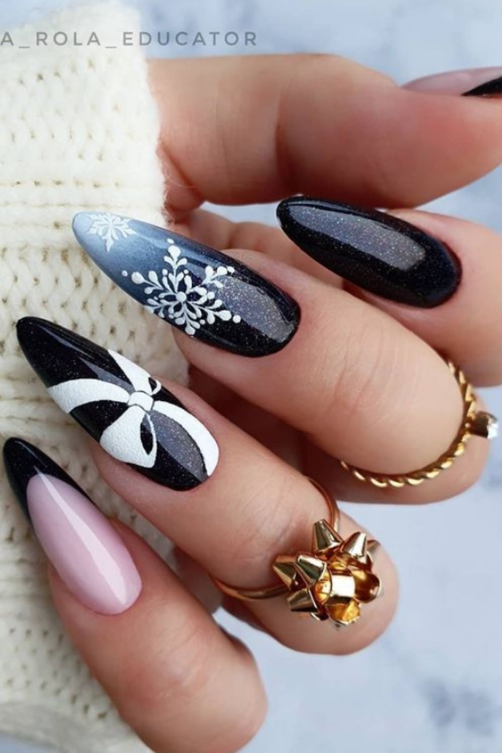 Black and snowflake almond nails art