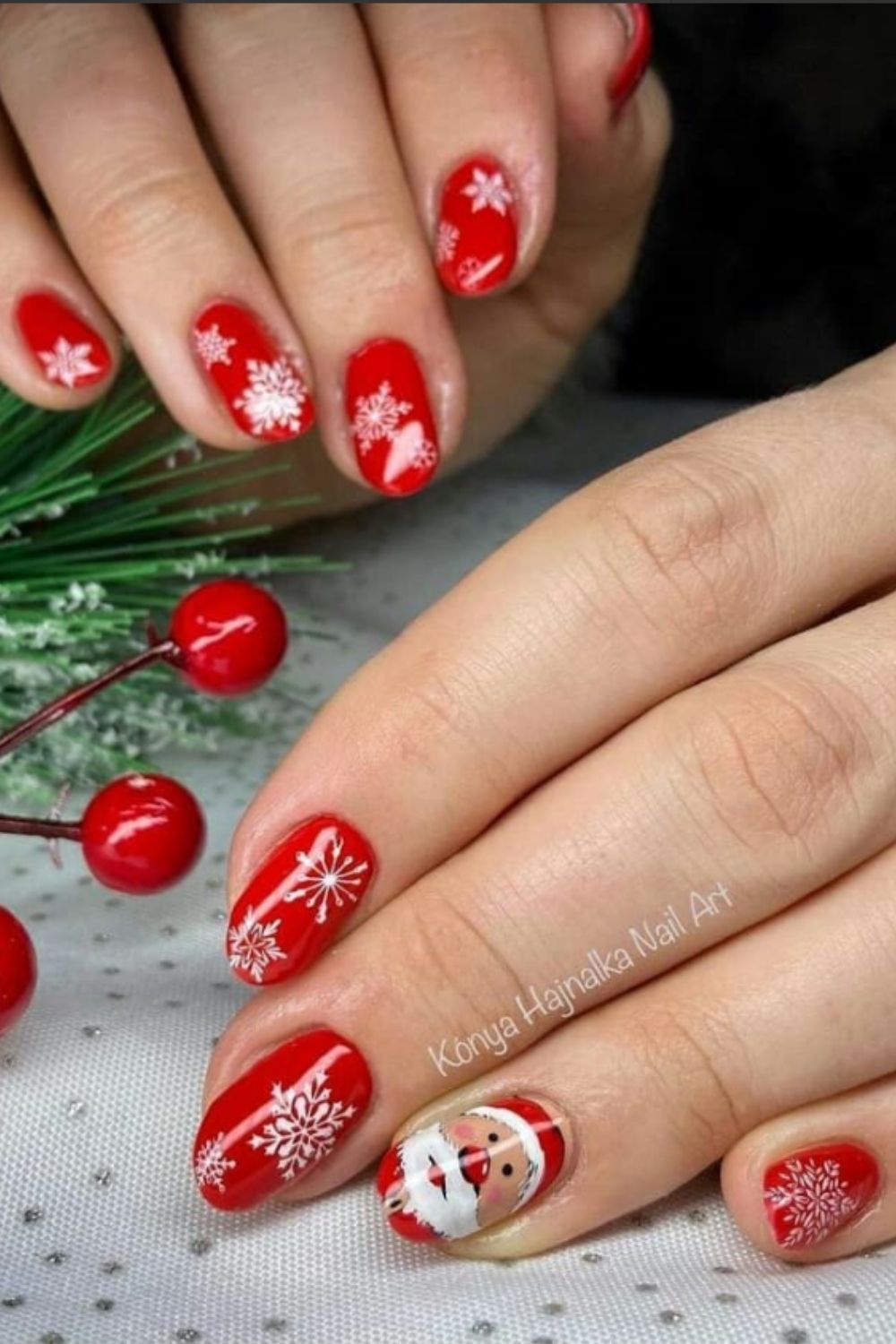 Red short nails art with snowflake