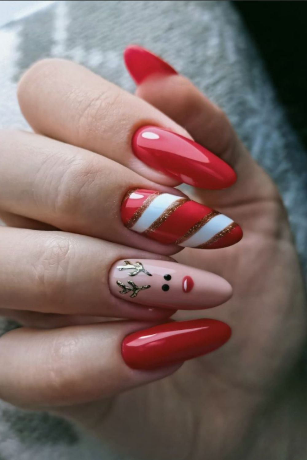 Gold and red almond nails designs