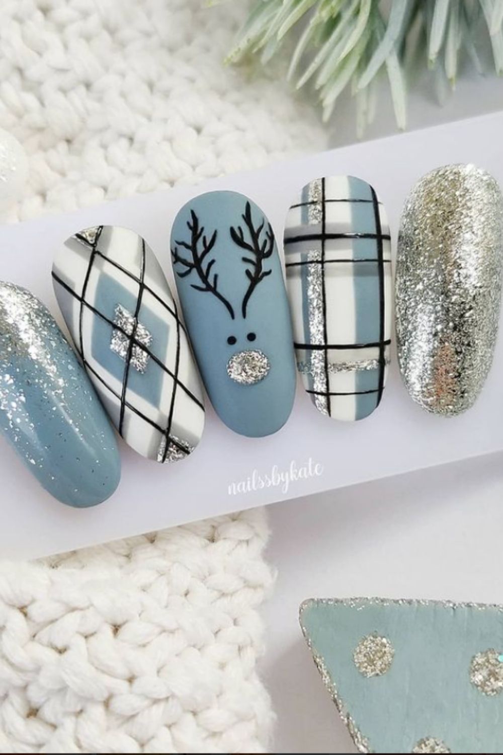 Silver and light blue winter nail designs