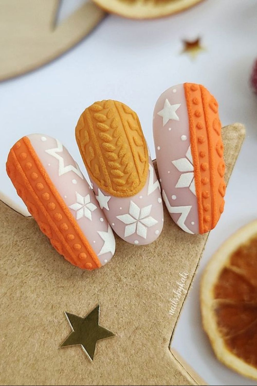 Orange and pink winter nail art