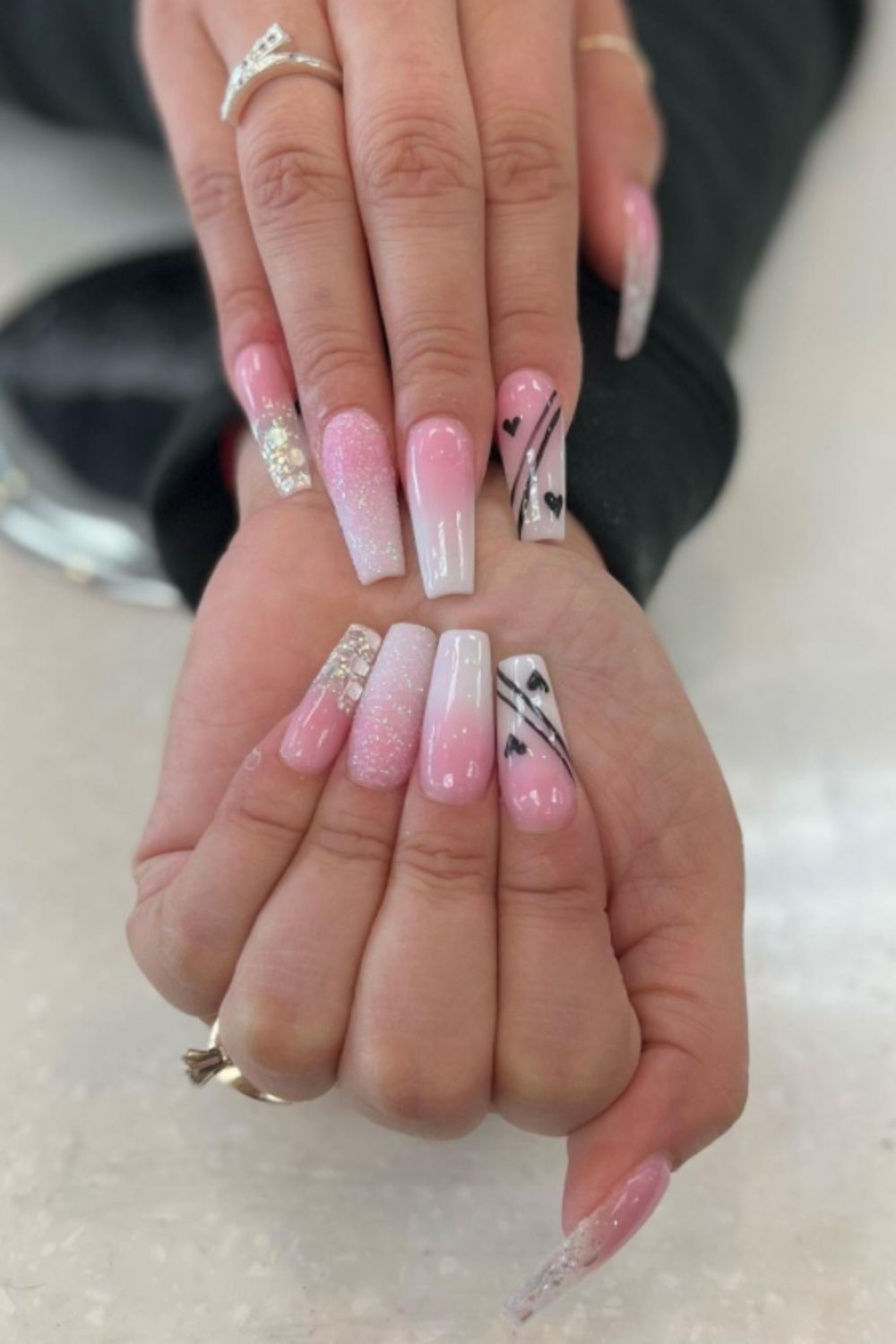 Pink and white coffin nail art designs of 2022 with small heart