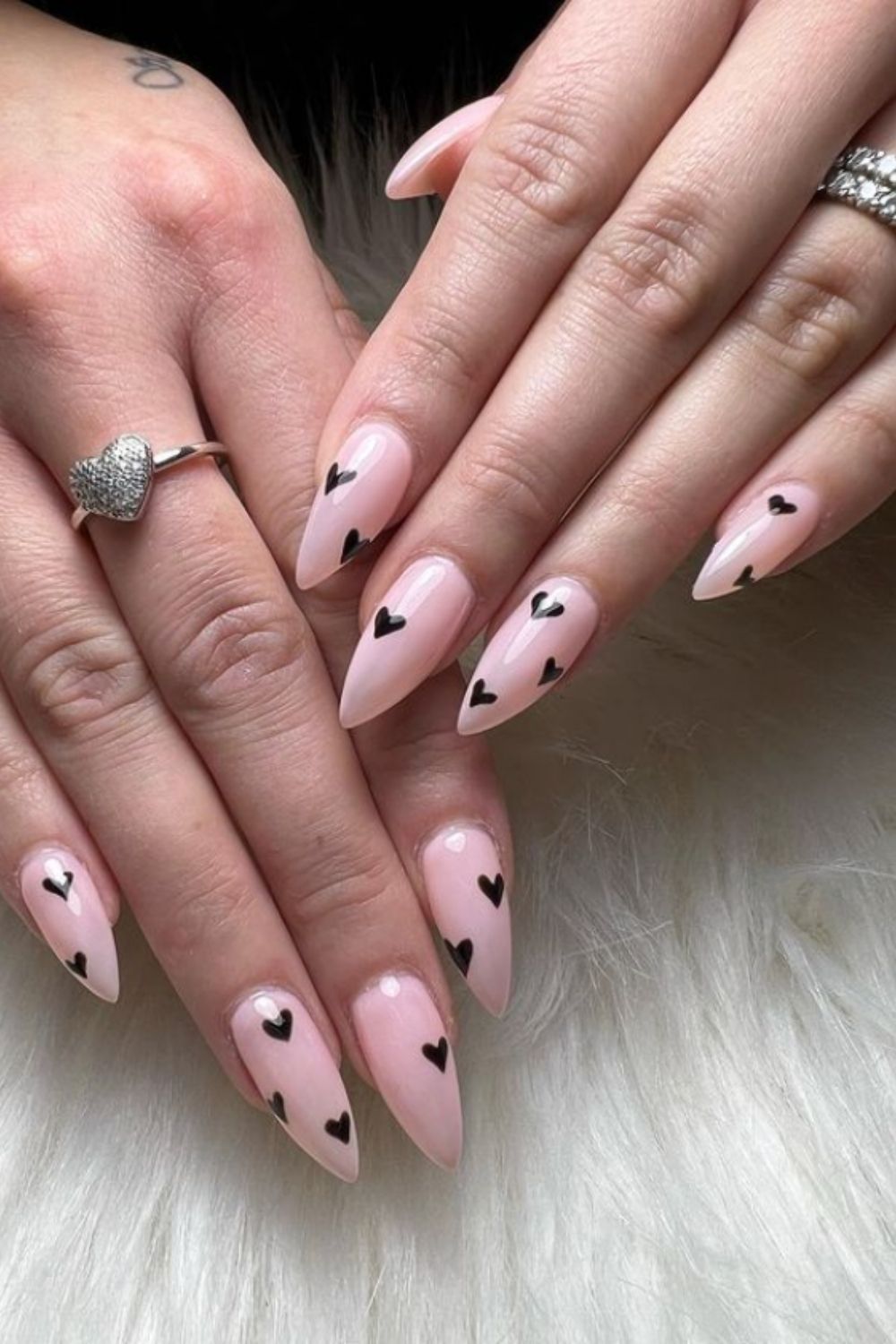 Pink almond nail ideas with black small heart