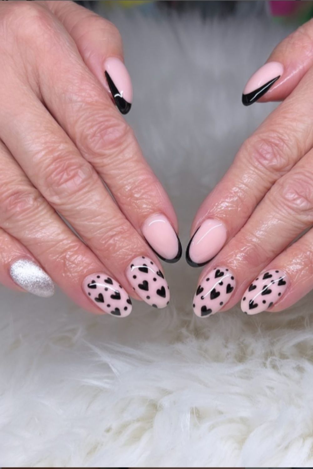 Pink and black heart almond nails ideas