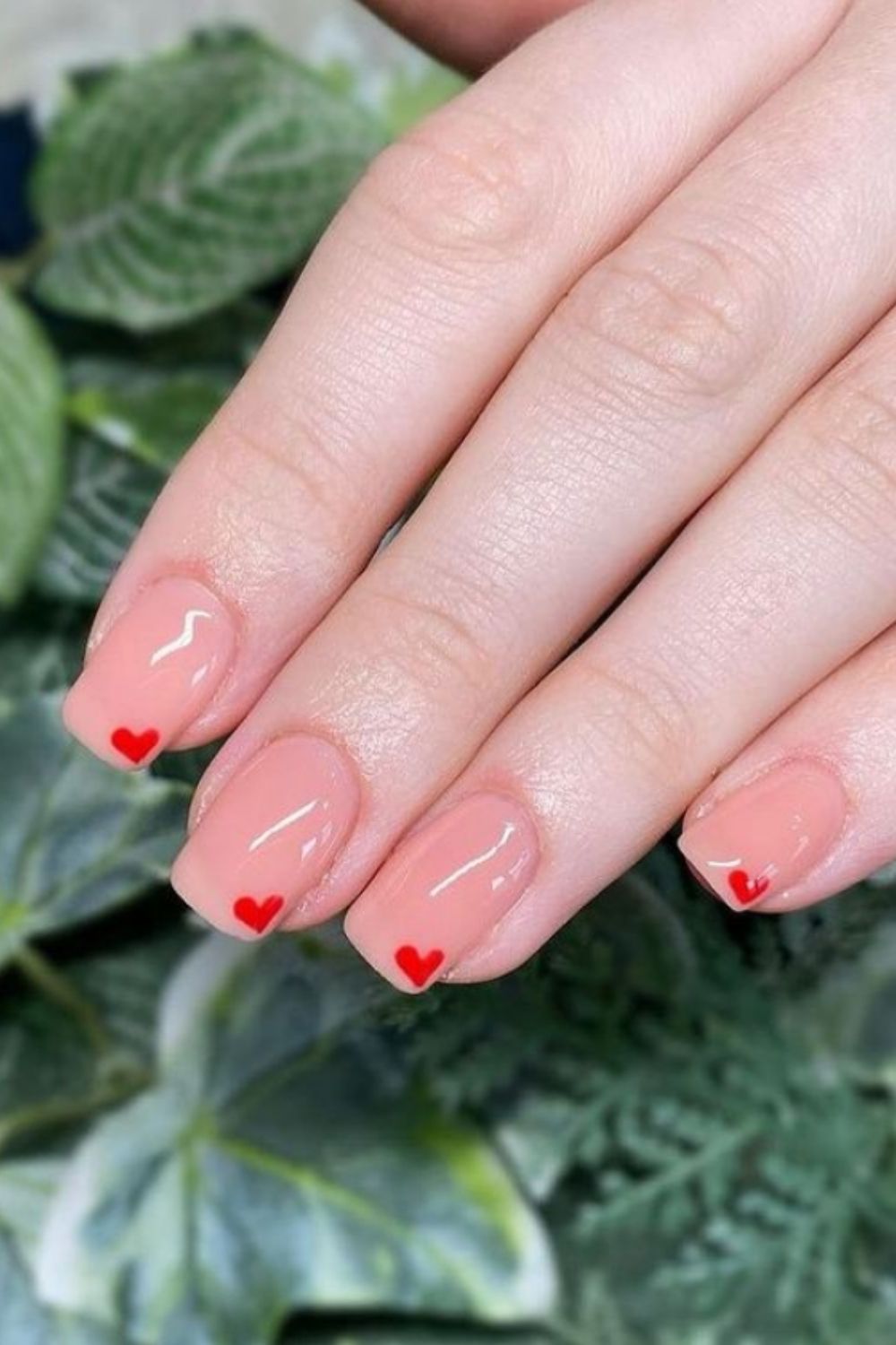 Pink short nail art designs with red heart