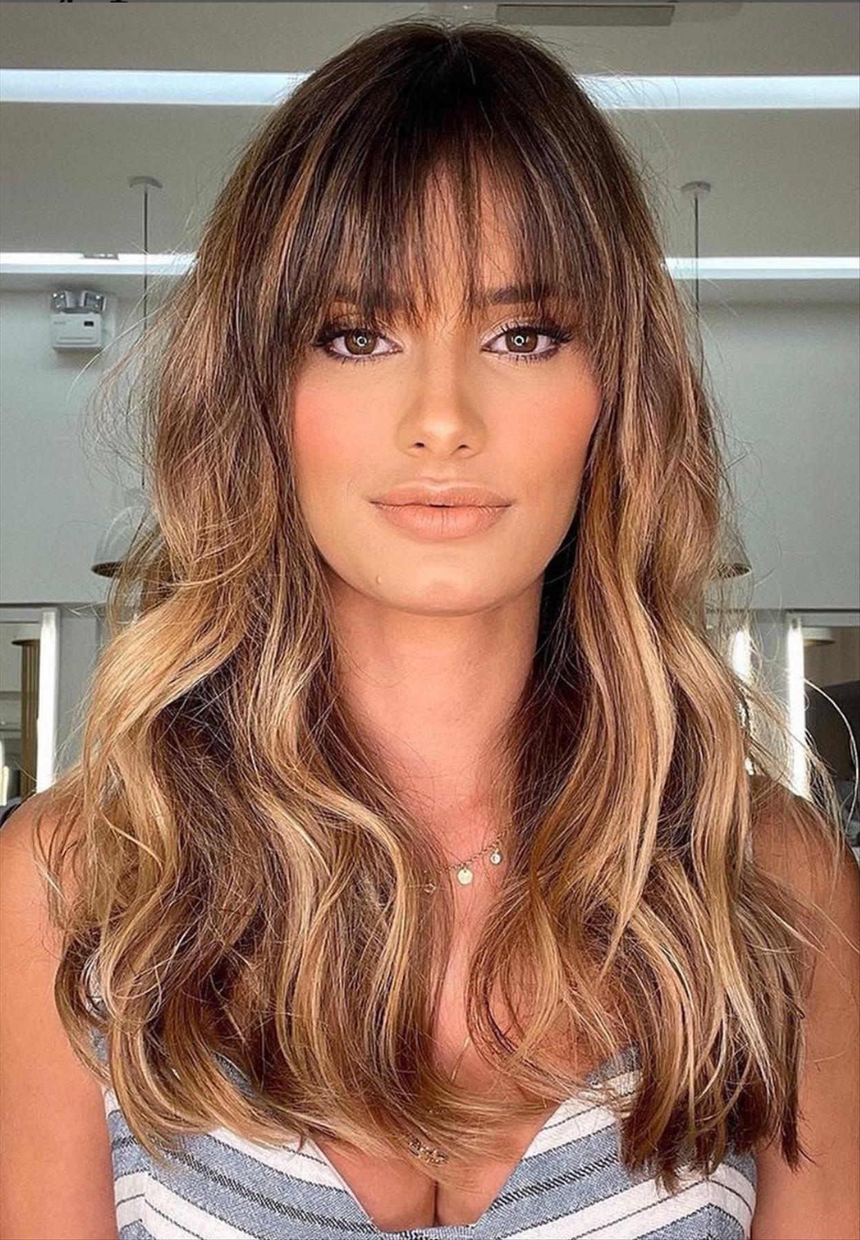 Trendy hairstyles with bangs and layers you'll love