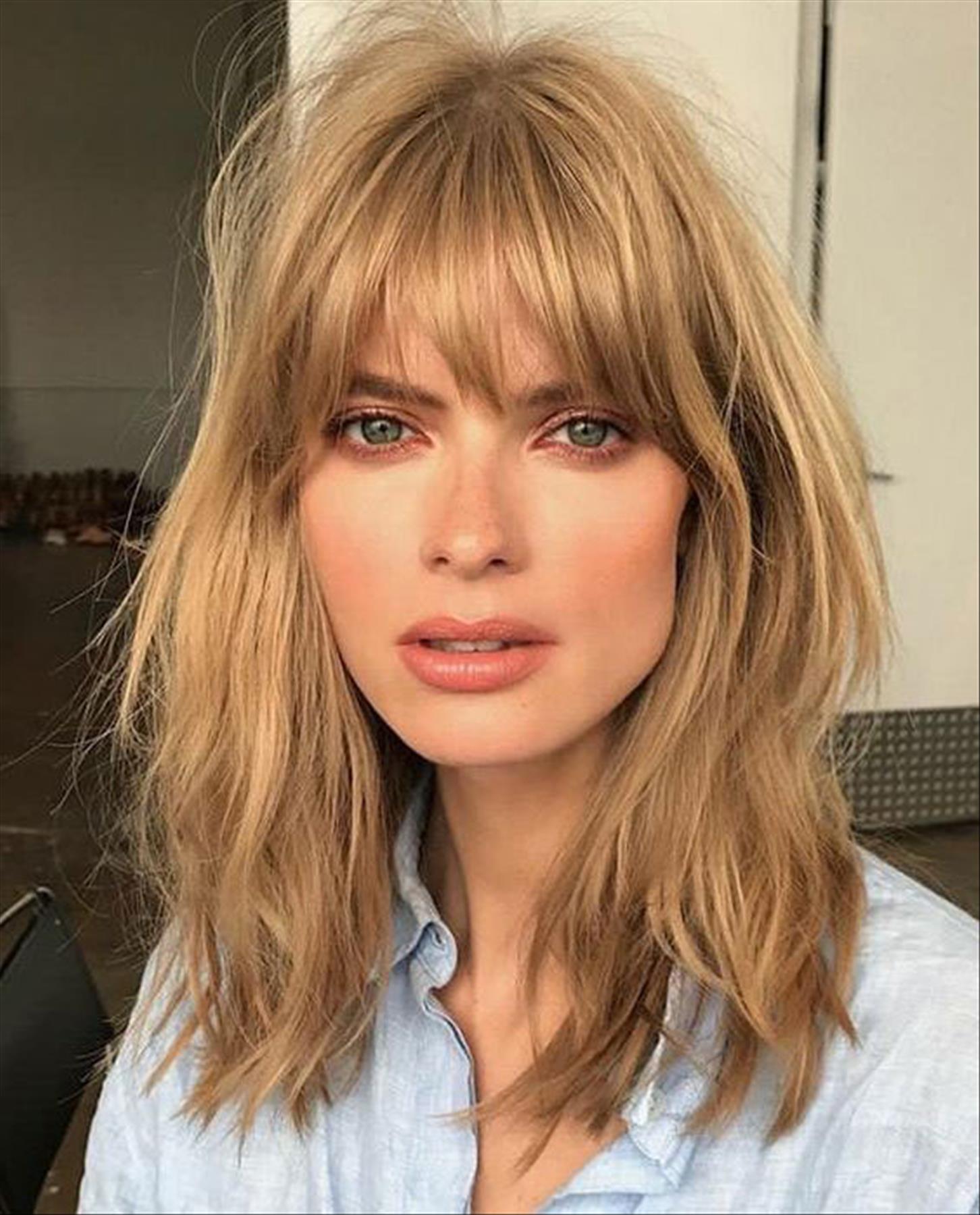 Hairstyle with bangs 2022 inspo curtain bangs and fringe bangs hair trends