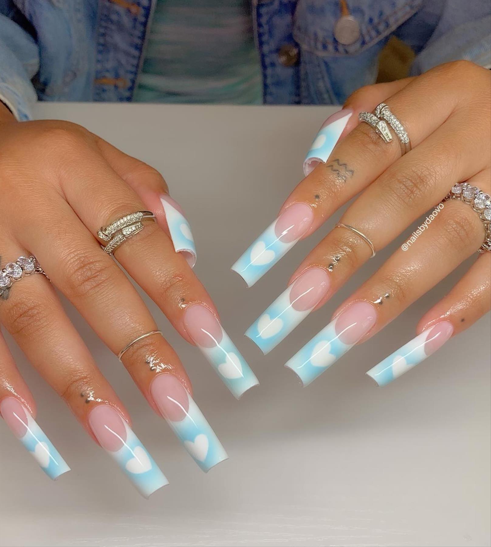 Luxury French tip coffin nails you'll flip for