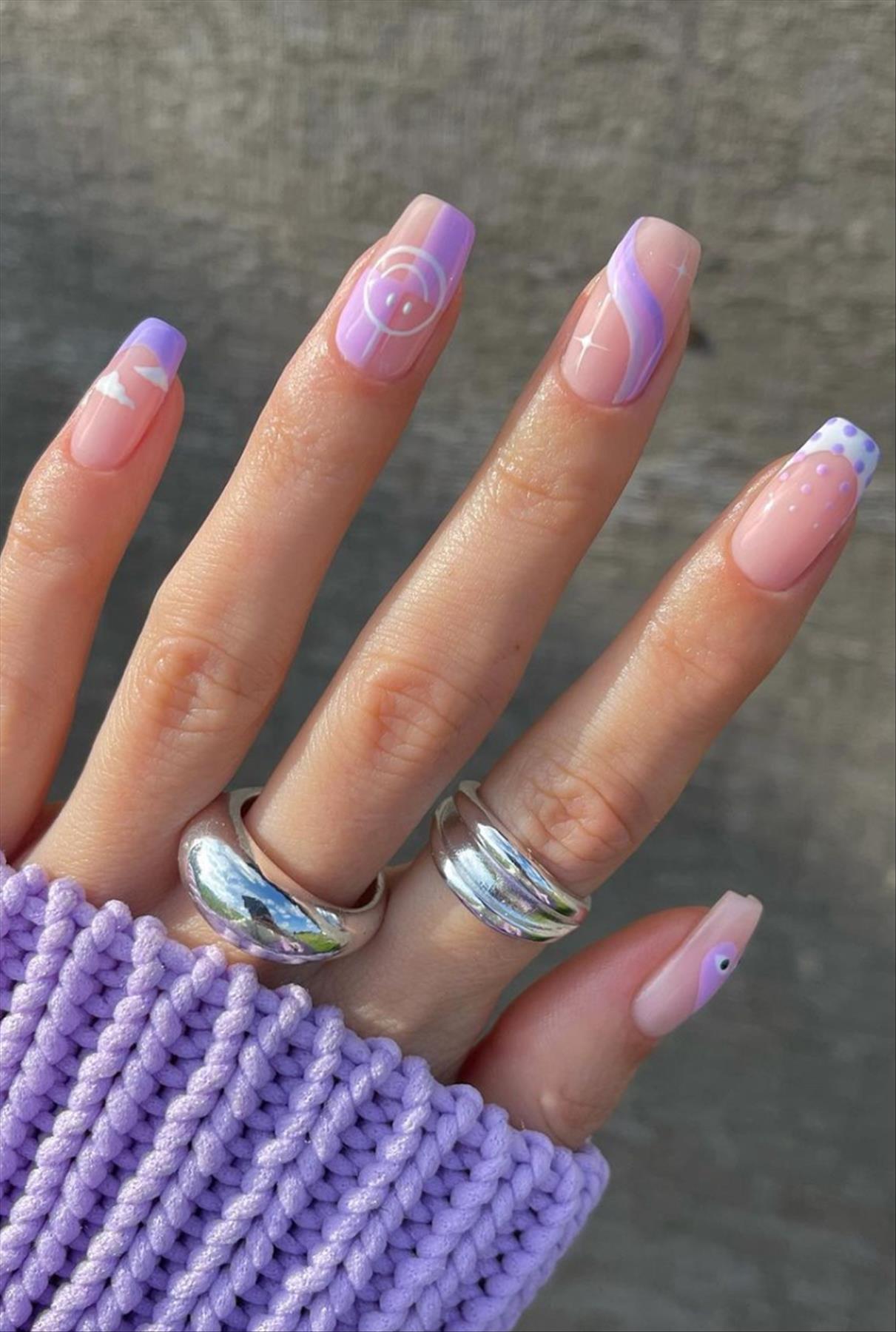 Elegant spring abstract nails and swirl nails to try