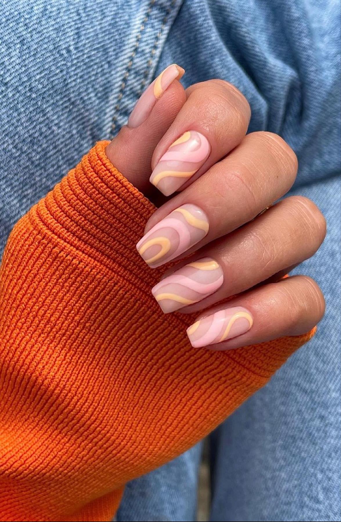 Elegant spring abstract nails and swirl nails to try