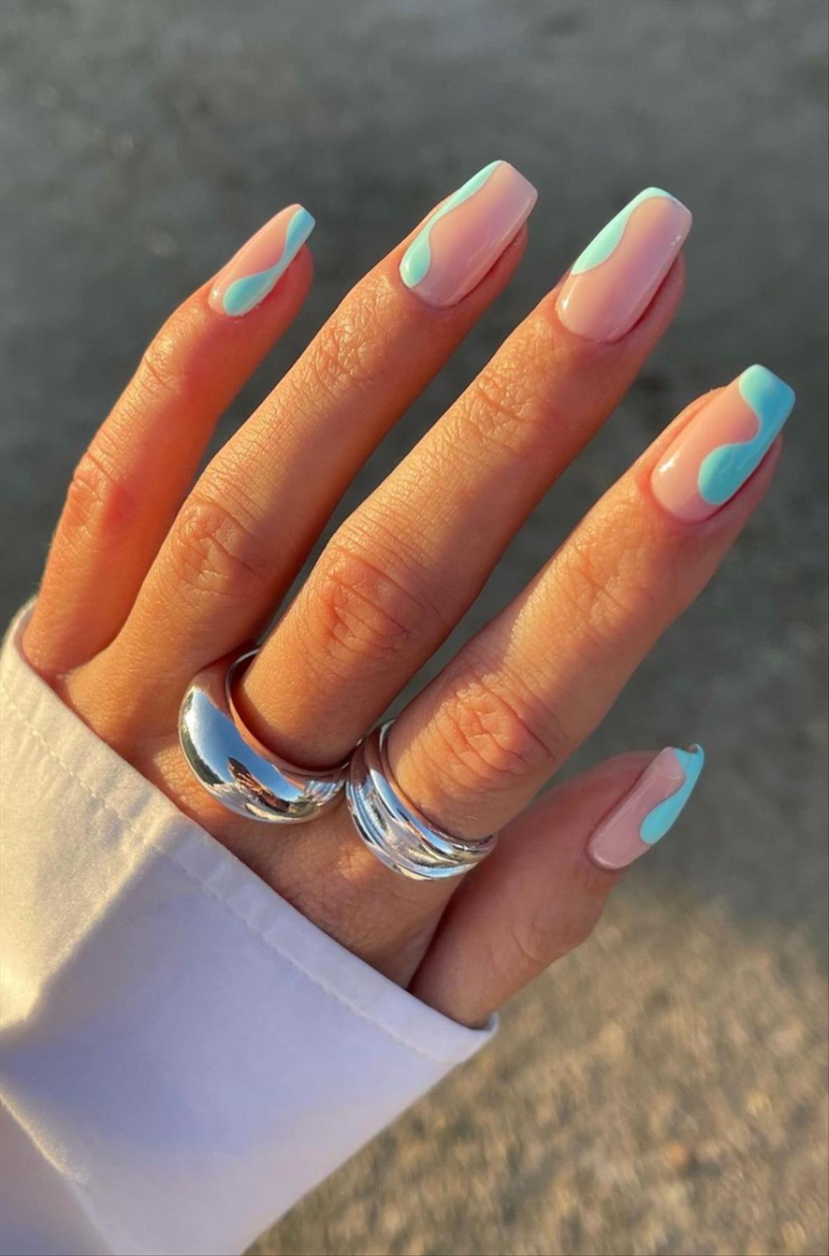 Elegant spring abstract nails and swirl nails to try